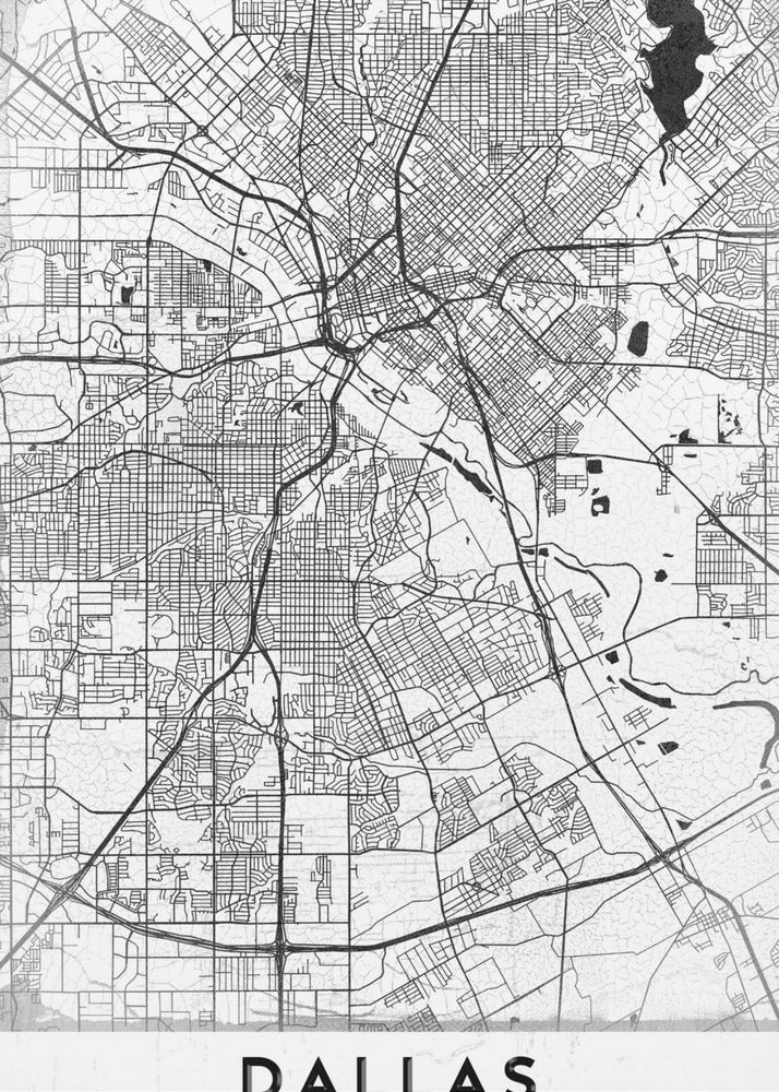 A minimalist black and white street map of Dallas, Texas, presented vertically in a black frame. The intricate network of roads and highways is depicted in black lines on a light gray, textured background, with the city's name 'DALLAS' in bold capital letters at the bottom. Poster