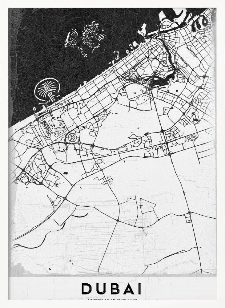 A minimalist black and white map of Dubai in a black frame. The water is depicted in black with a subtle texture, while the land is white, showing the city's road network in thin black lines. Key features like the Palm Jumeirah and The World Islands are visible off the coast. The word 'DUBAI' is written in a bold, black, sans-serif font at the bottom. Decor