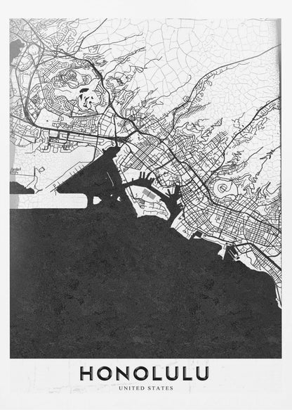 A framed, minimalist black and white map of Honolulu, Hawaii. The city's streets and coastline are rendered in black lines on a white background, while the ocean is a solid, textured black. The word 'HONOLULU' is printed in black sans-serif font at the bottom. Artwork