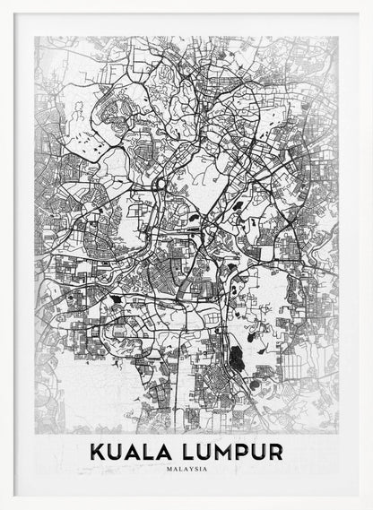 A minimalist black and white street map of Kuala Lumpur, displayed in a black frame. The map shows a detailed network of roads and city blocks on a textured white background. The name "KUALA LUMPUR" is printed in a bold, modern font at the bottom. Decor