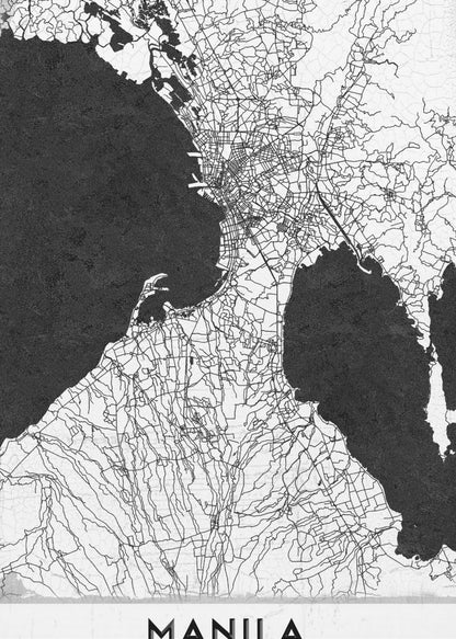 A minimalist black and white map of Manila, Philippines, presented in a black frame. The map showcases the city's intricate road network in black lines on a white landmass, contrasted against textured black bodies of water. The word 'MANILA' is printed in a bold, black sans-serif font at the bottom of the poster. Decor