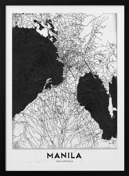 A minimalist black and white map of Manila, Philippines, presented in a black frame. The map showcases the city's intricate road network in black lines on a white landmass, contrasted against textured black bodies of water. The word 'MANILA' is printed in a bold, black sans-serif font at the bottom of the poster. Decor
