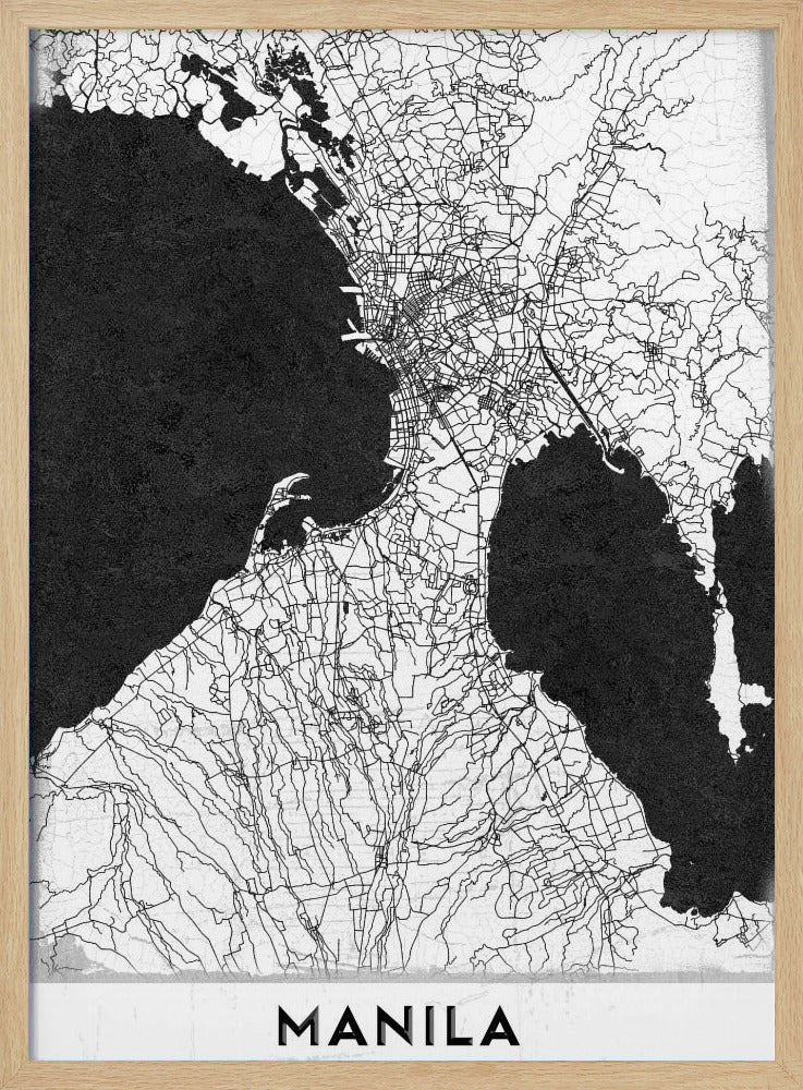 A minimalist black and white map of Manila, Philippines, presented in a black frame. The map showcases the city's intricate road network in black lines on a white landmass, contrasted against textured black bodies of water. The word 'MANILA' is printed in a bold, black sans-serif font at the bottom of the poster. Decor
