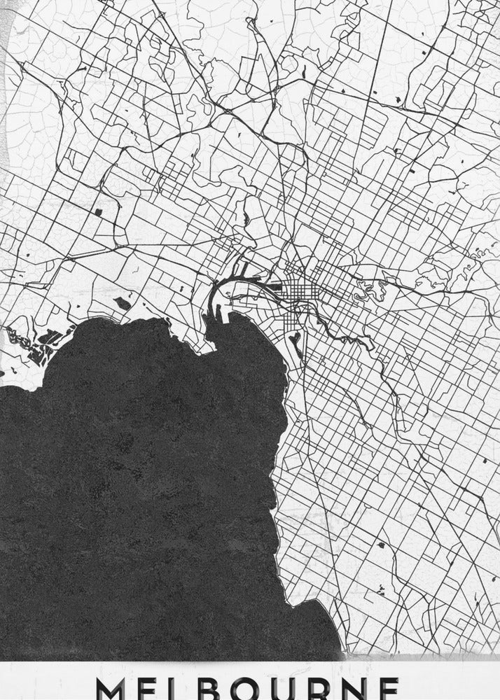 A minimalist black and white map of Melbourne, Australia, presented in a black frame. The city's road network is depicted with fine black lines on a textured white background, while the adjacent bay is shown in solid, textured black. The name 'MELBOURNE' is written in a bold, black font at the bottom. Poster