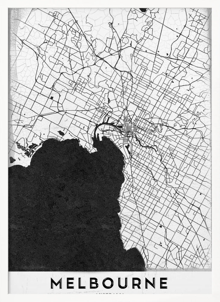 A minimalist black and white map of Melbourne, Australia, presented in a black frame. The city's road network is depicted with fine black lines on a textured white background, while the adjacent bay is shown in solid, textured black. The name 'MELBOURNE' is written in a bold, black font at the bottom. Poster