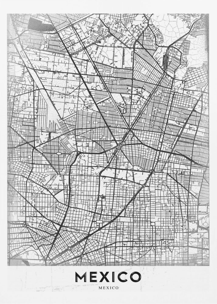 A modern, minimalist black and white art print of a street map of Mexico City, enclosed in a simple black frame. The intricate road network is depicted with black lines on a textured white background. The word 'MEXICO' is printed in bold, black capital letters at the bottom. Print