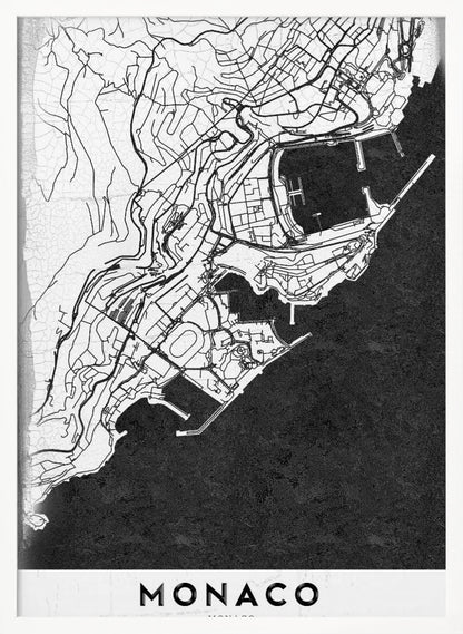 A modern black and white map of Monaco, presented as a framed poster. The map details the city's streets and coastline in black lines on a white background, while the sea is depicted in a solid, textured black. The title 'MONACO' is at the bottom in a bold, white band. Poster
