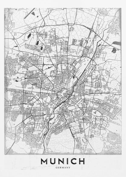 A minimalist black and white street map of Munich, Germany, presented in a thin black frame. The map shows intricate road networks and geographical features on a textured white background, with the word 'MUNICH' in a bold, black, sans-serif font at the bottom. Wall Art