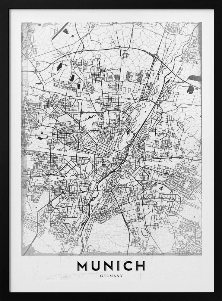 A minimalist black and white street map of Munich, Germany, presented in a thin black frame. The map shows intricate road networks and geographical features on a textured white background, with the word 'MUNICH' in a bold, black, sans-serif font at the bottom. Wall Art