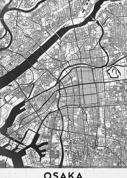 A framed black and white map of Osaka, Japan. The map details the city's streets, blocks, and rivers in a modern, graphic style. At the bottom, a white border contains the word 'OSAKA' in a bold, black, sans-serif font. Print