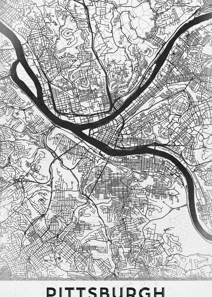 A minimalist black and white map of Pittsburgh, Pennsylvania, in a black frame. The map details the city's streets and the confluence of the Allegheny, Monongahela, and Ohio rivers. The word 'PITTSBURGH' is printed in a bold, sans-serif font at the bottom. Decor