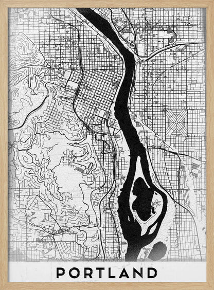 A framed, black and white street map of Portland, Oregon. The map is stylized with black lines for streets on a textured white background, and the Willamette River is depicted in solid black. The word 'PORTLAND' is written in a bold, black, sans-serif font at the bottom. Decor