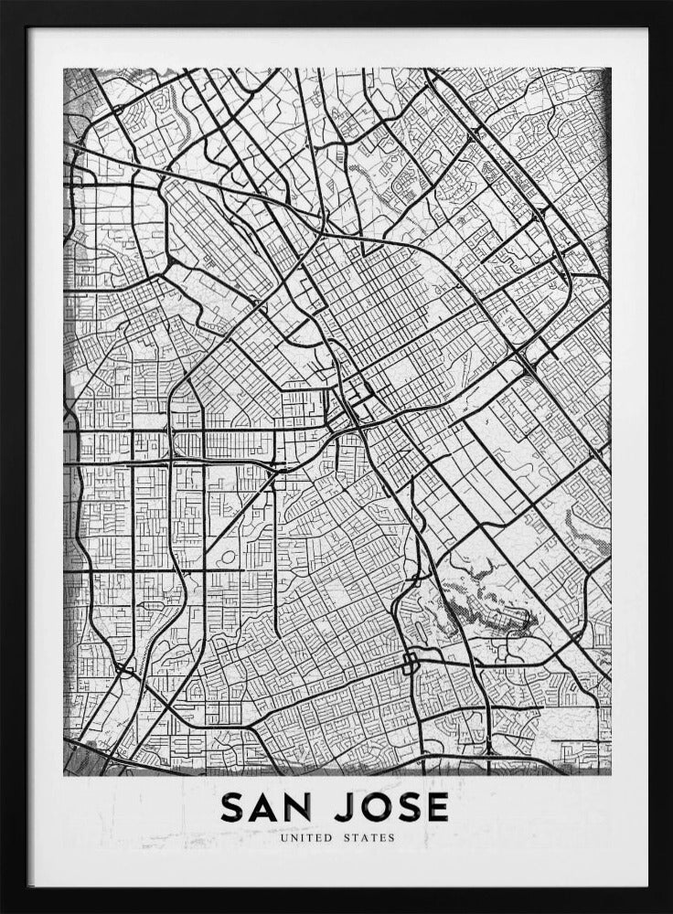 A minimalist black and white street map of San Jose, California, presented as a framed poster. The map details the city's grid, highways, and roads in black lines on a slightly textured white background. The text 'SAN JOSE' is written in a bold, black, sans-serif font at the bottom. Wall Art