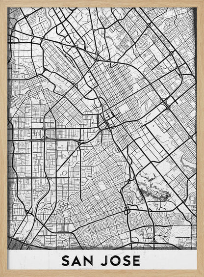A minimalist black and white street map of San Jose, California, presented as a framed poster. The map details the city's grid, highways, and roads in black lines on a slightly textured white background. The text 'SAN JOSE' is written in a bold, black, sans-serif font at the bottom. Wall Art