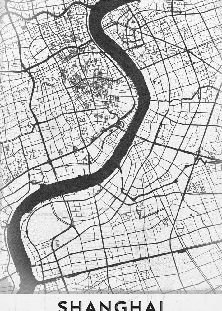 A minimalist black and white street map of Shanghai in a black frame. The map highlights the city's road network and the prominent Huangpu River, with the name 'SHANGHAI' printed at the bottom. Decor