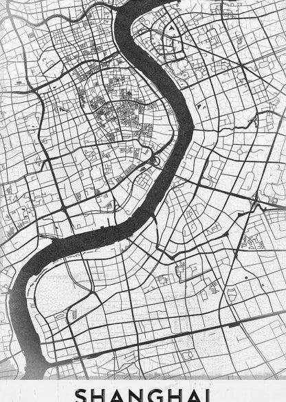 A minimalist black and white street map of Shanghai in a black frame. The map highlights the city's road network and the prominent Huangpu River, with the name 'SHANGHAI' printed at the bottom. Decor
