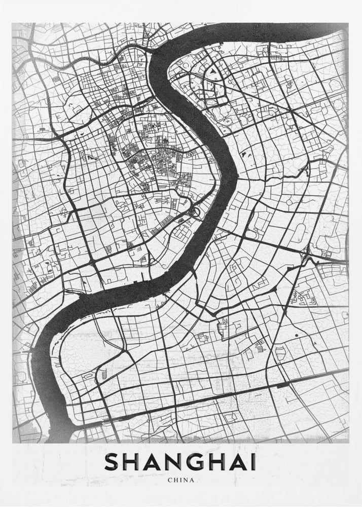 A minimalist black and white street map of Shanghai in a black frame. The map highlights the city's road network and the prominent Huangpu River, with the name 'SHANGHAI' printed at the bottom. Decor