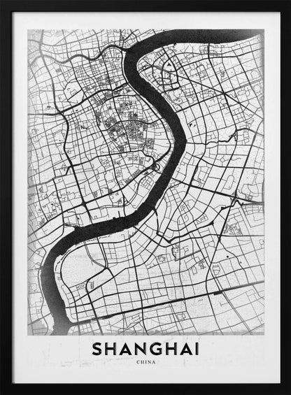 A minimalist black and white street map of Shanghai in a black frame. The map highlights the city's road network and the prominent Huangpu River, with the name 'SHANGHAI' printed at the bottom. Decor