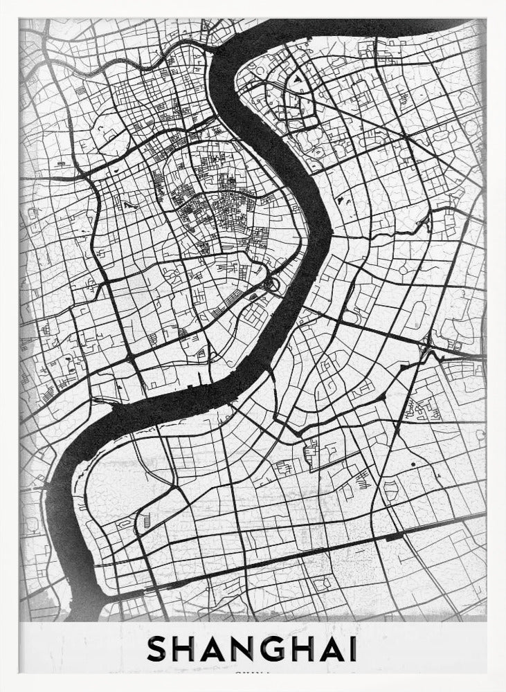 A minimalist black and white street map of Shanghai in a black frame. The map highlights the city's road network and the prominent Huangpu River, with the name 'SHANGHAI' printed at the bottom. Decor