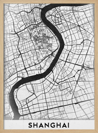 A minimalist black and white street map of Shanghai in a black frame. The map highlights the city's road network and the prominent Huangpu River, with the name 'SHANGHAI' printed at the bottom. Decor
