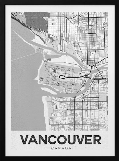 A modern, black and white framed art print of a city map of Vancouver. The map features a stylized layout of roads, rivers, and the coastline, including what appears to be an airport. The word 'VANCOUVER' is displayed in bold, capital letters at the bottom. Poster