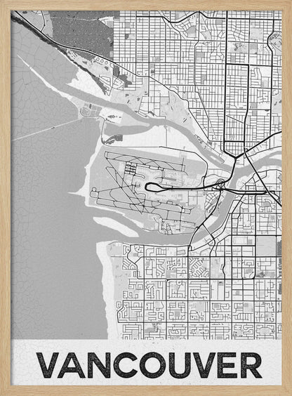 A modern, black and white framed art print of a city map of Vancouver. The map features a stylized layout of roads, rivers, and the coastline, including what appears to be an airport. The word 'VANCOUVER' is displayed in bold, capital letters at the bottom. Poster