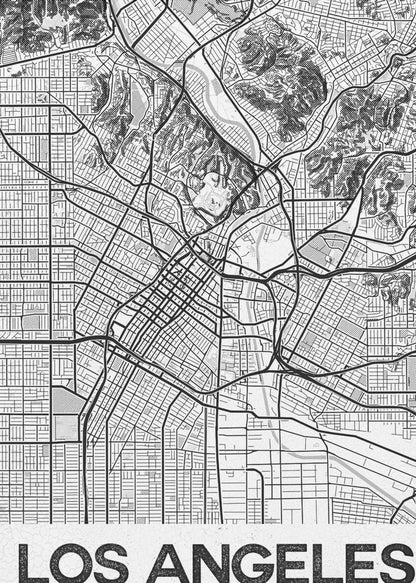A modern, framed black and white map of Los Angeles. The detailed illustration features a dense grid of city streets, winding highways, rivers, and topographic details of hills. A white banner at the bottom displays the words 'LOS ANGELES' in a bold, black, textured font. Poster