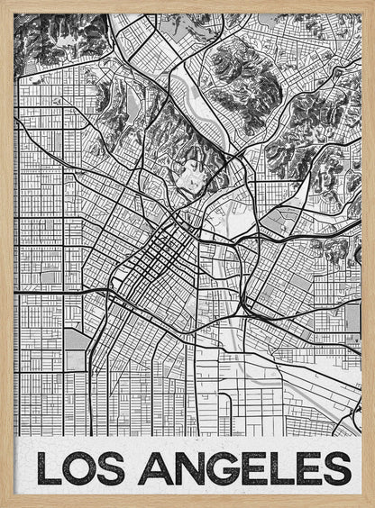 A modern, framed black and white map of Los Angeles. The detailed illustration features a dense grid of city streets, winding highways, rivers, and topographic details of hills. A white banner at the bottom displays the words 'LOS ANGELES' in a bold, black, textured font. Poster