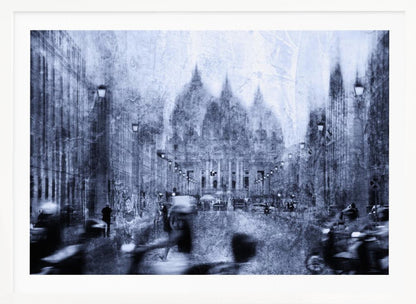 A stylized, heavily textured photograph of a busy city street in shades of blue, grey, and white. A grand, domed building stands at the end of the street, while the figures of people and vehicles in the foreground are blurred with motion, creating a dynamic and atmospheric scene. The entire image has a distressed, weathered appearance and is set within a silver frame. Print