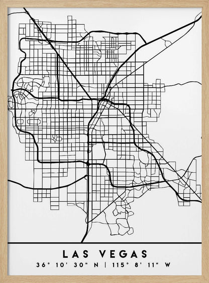 A minimalist black and white framed map of Las Vegas, showcasing the city's street grid and major highways. Below the map, the city's name and geographical coordinates are printed in a clean, modern font. Poster