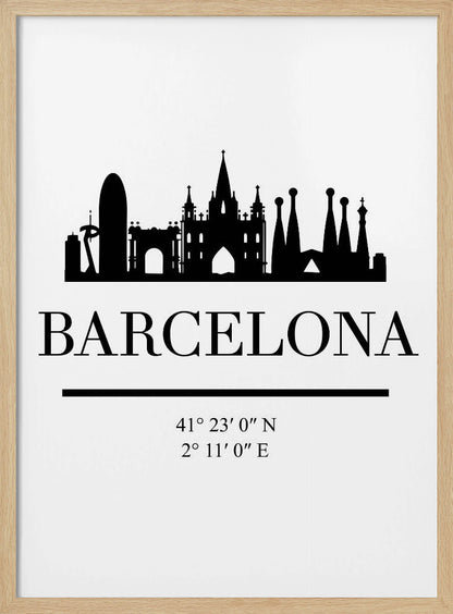 A minimalist black and white poster of Barcelona, Spain. It features a black silhouette of the city's skyline, including the Sagrada Familia, above the word 'BARCELONA' in a large serif font. Below the city name are its geographical coordinates, all set against a clean white background and framed in black. Print