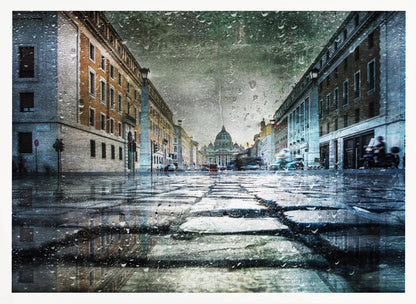 A low-angle, artistic photograph of a wet cobblestone street in Rome leading to St. Peter's Basilica in the distance. The image has a moody, textured feel with an overlay of raindrops, as if viewed through a rainy window, and reflections of the historic buildings in the puddles on the street. Decor