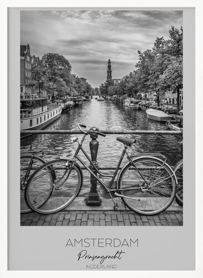 A black and white poster of the Prinsengracht canal in Amsterdam. A bicycle is parked on a bridge in the foreground, overlooking the canal lined with houseboats, trees, and traditional Dutch buildings. The Westerkerk church tower is visible in the distance. The poster has a white border with the words 'AMSTERDAM', 'Prinsengracht', and 'NEDERLAND' at the bottom. Poster