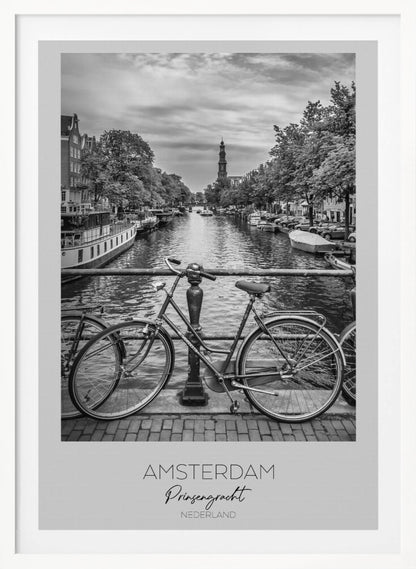 A black and white poster of the Prinsengracht canal in Amsterdam. A bicycle is parked on a bridge in the foreground, overlooking the canal lined with houseboats, trees, and traditional Dutch buildings. The Westerkerk church tower is visible in the distance. The poster has a white border with the words 'AMSTERDAM', 'Prinsengracht', and 'NEDERLAND' at the bottom. Poster