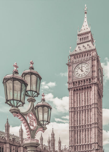 A stylized, low-angle photograph of Big Ben in London, with an ornate Victorian lamppost in the foreground. The image is color-graded with a pale teal sky and pink-toned architecture, creating a vintage, dreamy aesthetic. Wall Art