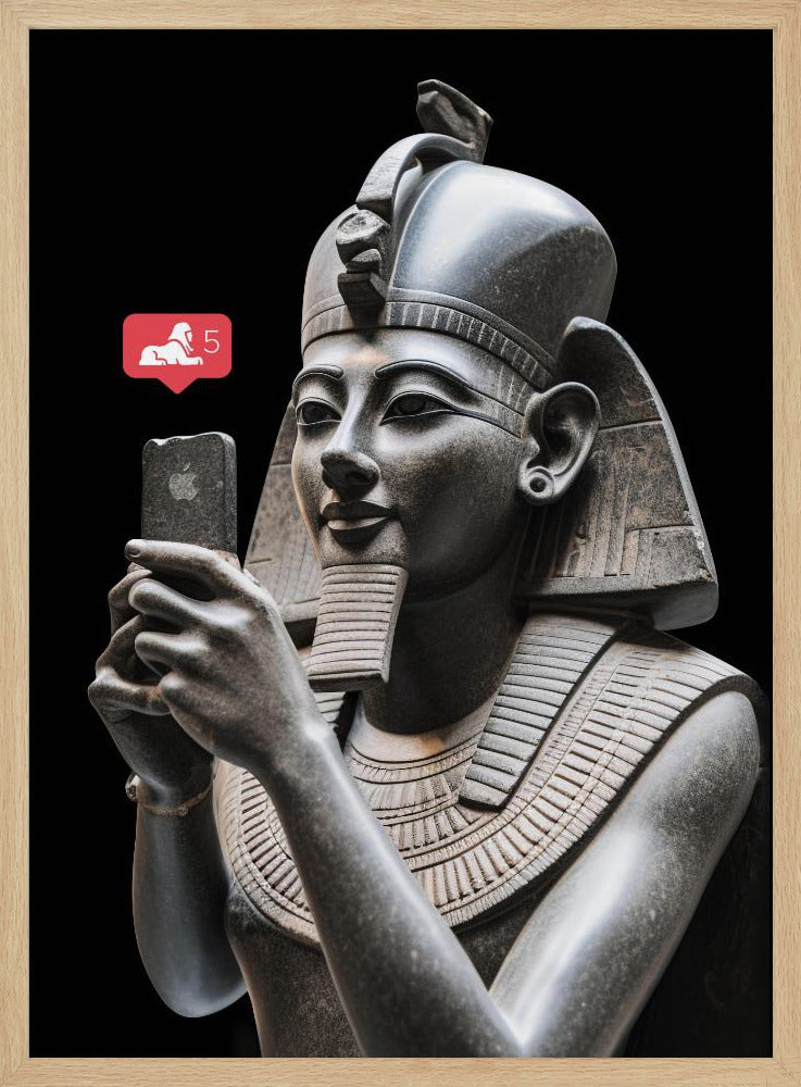 A humorous digital artwork depicting a detailed, dark grey stone bust of an ancient Egyptian pharaoh holding a modern smartphone and looking at it with a slight smile. A red social media notification with a sphinx icon and the number 5 floats next to the phone against a solid black background. Wall Art