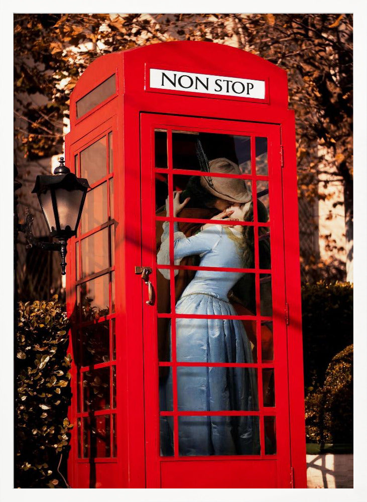 A couple in vintage clothing share a passionate kiss inside a classic bright red telephone booth. The woman is wearing a light blue dress, and the man wears a hat. The sign above the booth door reads 'NON STOP'. The setting appears to be outdoors in autumn. Wall Art