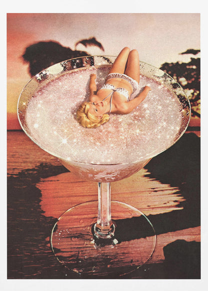 A surreal collage featuring a blonde woman in a white bikini lounging in a giant cocktail glass filled with a sparkling pink liquid, set against a warm sunset over the ocean. Print