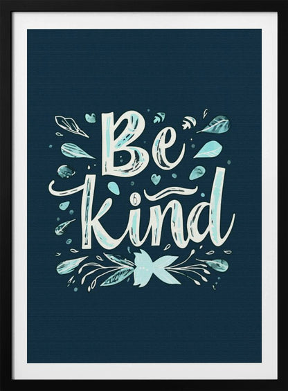 An inspirational art print with a dark blue background featuring the phrase 'Be Kind' in a stylized, hand-lettered white and light blue font. The text is decorated with small leaves, hearts, and flourishes in shades of teal and white. Artwork