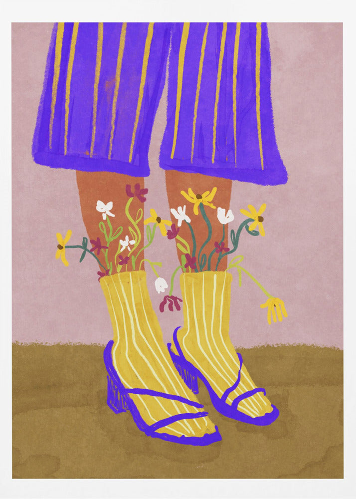 A stylized, colorful illustration focusing on the lower legs and feet of a person wearing vibrant clothing. They have on wide-legged, royal blue trousers with vertical yellow stripes, and yellow socks with white stripes. Small, colorful wildflowers sprout from the tops of their socks. They are wearing bright blue strappy heeled sandals. The background is a soft pink color with a brown floor. Wall Art