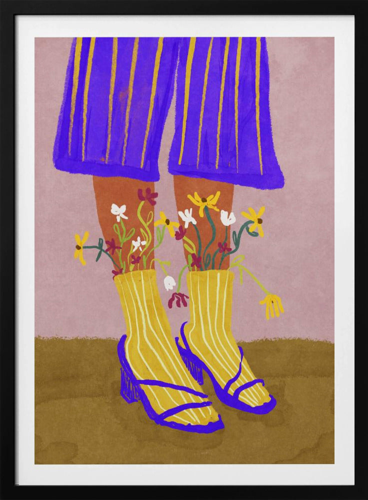 A stylized, colorful illustration focusing on the lower legs and feet of a person wearing vibrant clothing. They have on wide-legged, royal blue trousers with vertical yellow stripes, and yellow socks with white stripes. Small, colorful wildflowers sprout from the tops of their socks. They are wearing bright blue strappy heeled sandals. The background is a soft pink color with a brown floor. Wall Art