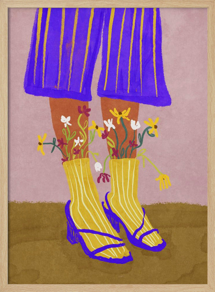 A stylized, colorful illustration focusing on the lower legs and feet of a person wearing vibrant clothing. They have on wide-legged, royal blue trousers with vertical yellow stripes, and yellow socks with white stripes. Small, colorful wildflowers sprout from the tops of their socks. They are wearing bright blue strappy heeled sandals. The background is a soft pink color with a brown floor. Wall Art