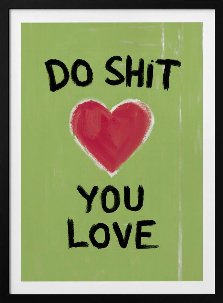 A framed modern art print with a light green background featuring the motivational phrase 'DO SHIT YOU LOVE' in black, hand-painted letters. A large, stylized red heart is painted between the top and bottom lines of text. Print