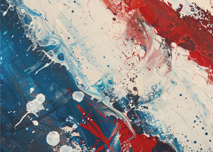 A close-up of an abstract painting in a silver frame, featuring a dynamic composition of red, white, and blue. Thick strokes of paint are splattered and swirled across the canvas, with a large area of deep blue on the left, a bold patch of bright red on the upper right, and a field of off-white in the middle. The piece has a textured, energetic quality. Artwork