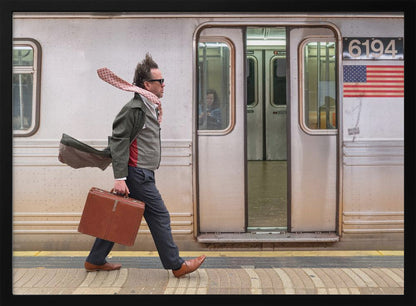 A stylish man with windblown hair and a flying scarf walks briskly along a subway platform, carrying a brown briefcase next to a silver train. Artwork