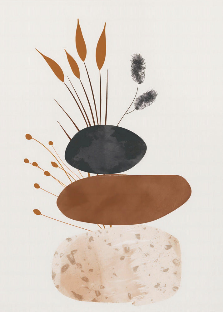 A minimalist abstract artwork featuring a stack of three organic, stone-like shapes against an off-white background, framed in black. The bottom shape is a speckled beige, the middle is a solid terracotta brown, and the top is a textured charcoal black. Various stylized botanical elements, including brown reeds and black fuzzy stems, emerge from behind the stack. Decor