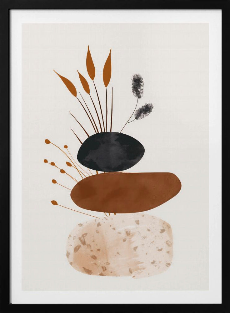 A minimalist abstract artwork featuring a stack of three organic, stone-like shapes against an off-white background, framed in black. The bottom shape is a speckled beige, the middle is a solid terracotta brown, and the top is a textured charcoal black. Various stylized botanical elements, including brown reeds and black fuzzy stems, emerge from behind the stack. Decor