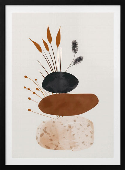 A minimalist abstract artwork featuring a stack of three organic, stone-like shapes against an off-white background, framed in black. The bottom shape is a speckled beige, the middle is a solid terracotta brown, and the top is a textured charcoal black. Various stylized botanical elements, including brown reeds and black fuzzy stems, emerge from behind the stack. Decor