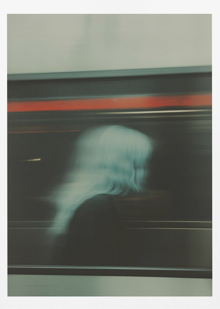 An abstract photograph with motion blur, featuring the ghostly silhouette of a person's head and shoulders in pale blue. The dark background is streaked with horizontal lines of red and white light, suggesting the speed of a passing train or subway. Wall Art