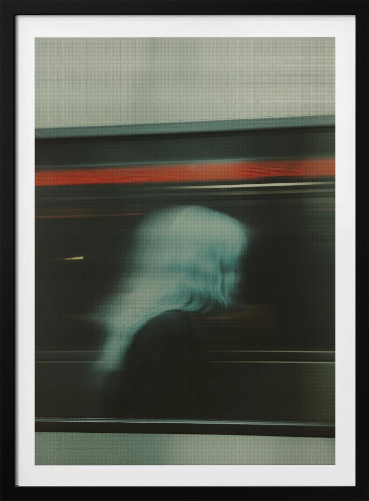 An abstract photograph with motion blur, featuring the ghostly silhouette of a person's head and shoulders in pale blue. The dark background is streaked with horizontal lines of red and white light, suggesting the speed of a passing train or subway. Wall Art